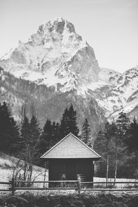 Built structure on mountain against sky