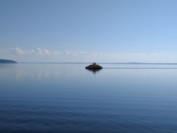 Boat sailing in sea