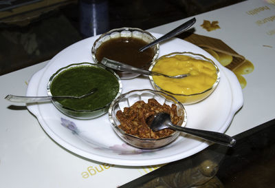 High angle view of drink in plate on table