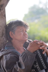 Portrait of man looking away