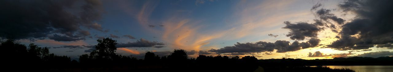 Scenic view of landscape against sky at sunset