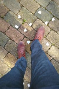 Low section of man standing on floor