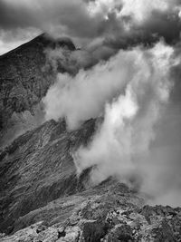 Scenic view of volcanic mountain against sky