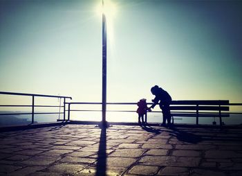 Silhouette of woman in sunlight