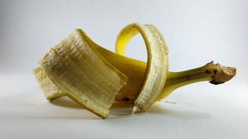 Close-up of lemon slice against white background