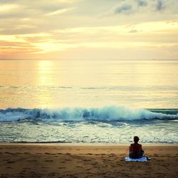 Scenic view of sea at sunset