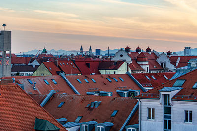 Cityscape of munich during sunset with the alps in the background