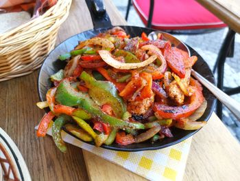 High angle view of vegetables in basket on table