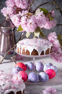 Beautiful easter cake on the table, and colored eggs, homemade cakes, still life