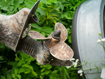 Rusty propeller on ship waiting in a dry dock for the start of the season