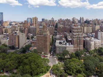 High angle view of street amidst buildings in city