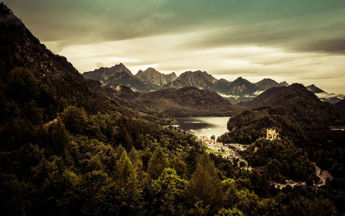 Scenic view from neuschwanstein castle to alpsee lake and hohenschwangau castle in bavaria / germany