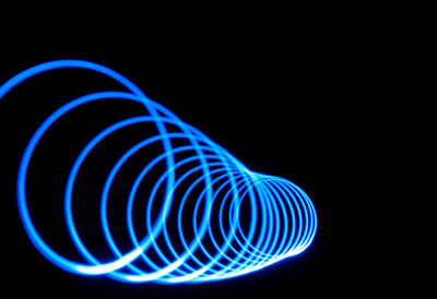 Light painting against black background