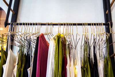 Low angle view of clothes hanging on rack