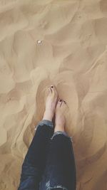 Low section of woman standing on floor