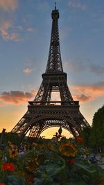 View of tower against cloudy sky