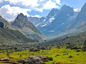 Scenic view of landscape and mountains against sky