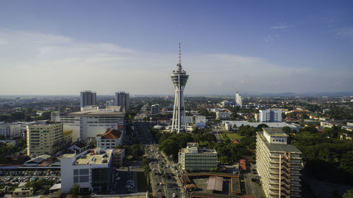 Modern buildings in city against sky