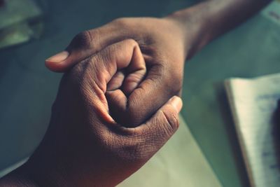 Cropped image of holding hands