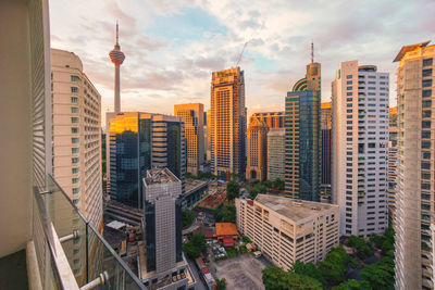 Skyscrapers in city against sky