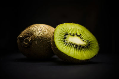 Close-up of lemon slice over black background