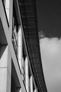 Low angle view of building against cloudy sky