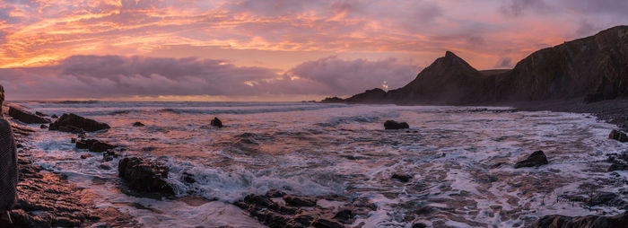 Scenic view of sea against sky during sunset