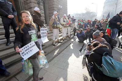 People on street in city