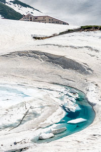 Aerial view of snow covered land