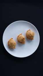 High angle view of cookies in plate