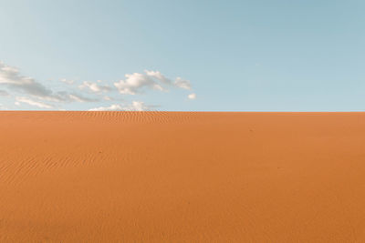 Scenic view of desert against sky