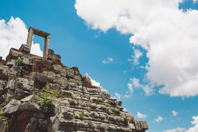 Low angle view of old building against sky