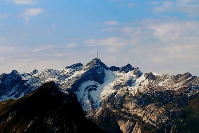 Scenic view of mountains against sky during winter