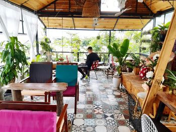 Rear view of man standing in restaurant