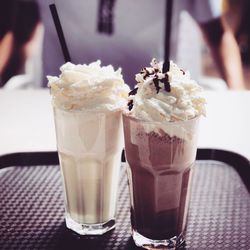 Close-up of ice cream in glass on table