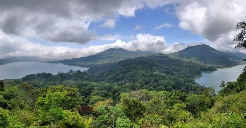 Scenic view of landscape and mountains against sky