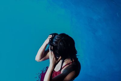 High angle view of woman in swimming pool