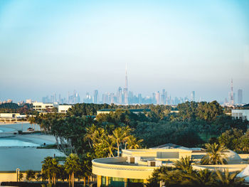 Buildings in city against sky