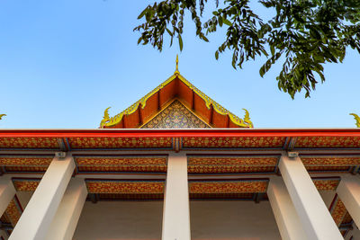 Low angle view of temple against building