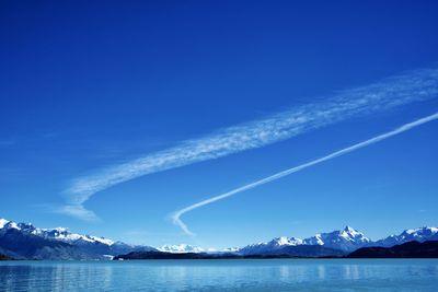 Scenic view of sea against blue sky