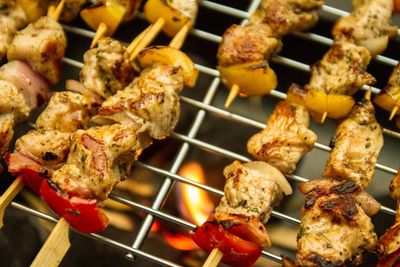 High angle view of meat on barbecue grill