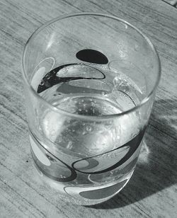 High angle view of drink in glass on table