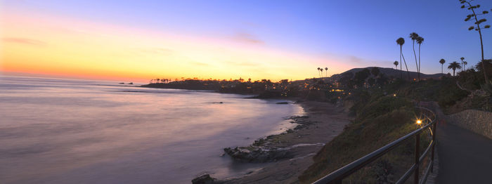 View of beach against sky during sunset