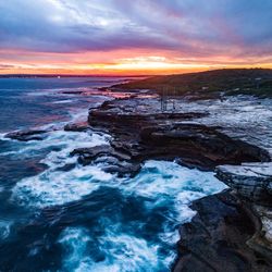 Scenic view of sea against dramatic sky