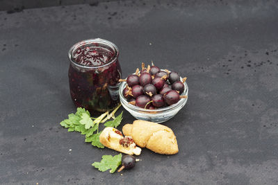 High angle view of fruits in jar on table