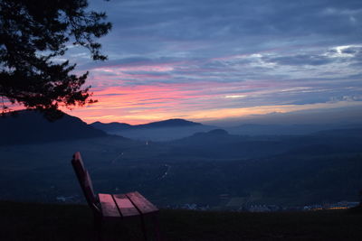 Scenic view of mountains against sky at sunset