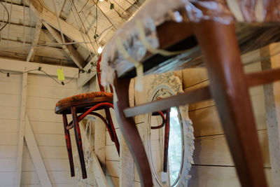 Low angle view of clothes hanging on ceiling at home