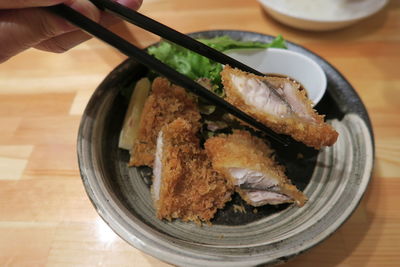 High angle view of meat in plate on table