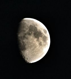 Low angle view of moon against sky at night