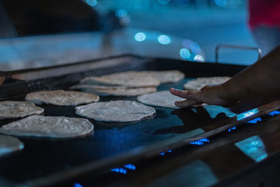 Midsection of person preparing food